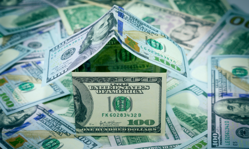 Image of money in the shape of a house