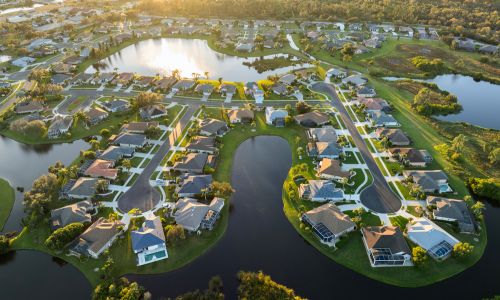 Aerial view of a Florida residential community surrounded by lakes, wetlands and waterways.