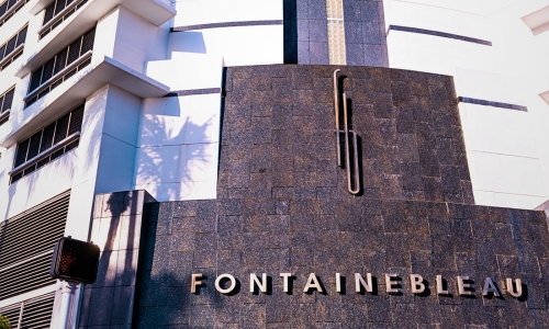 Photo of the Fontainebleau logo on the facade of the condo building