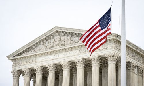 Image of US Supreme Court with American Flag